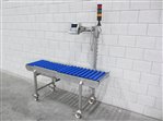 Rollenbaan met weegzone en weegindicator